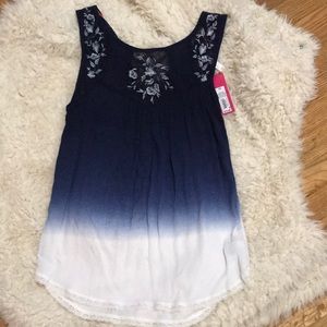 Blue and white sleeveless top